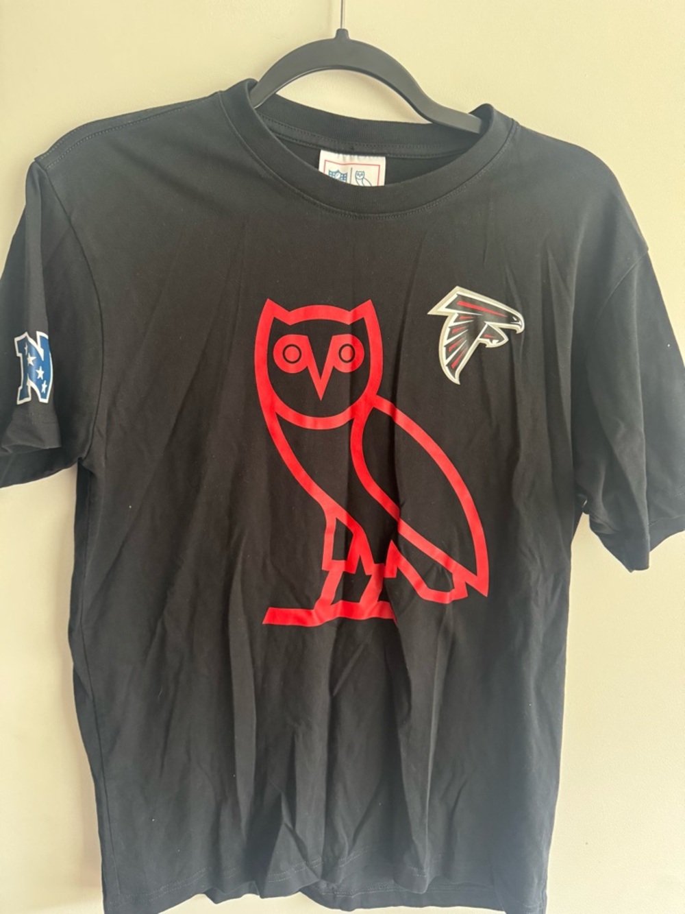 NFL Black Tee with Red and Blue Logo